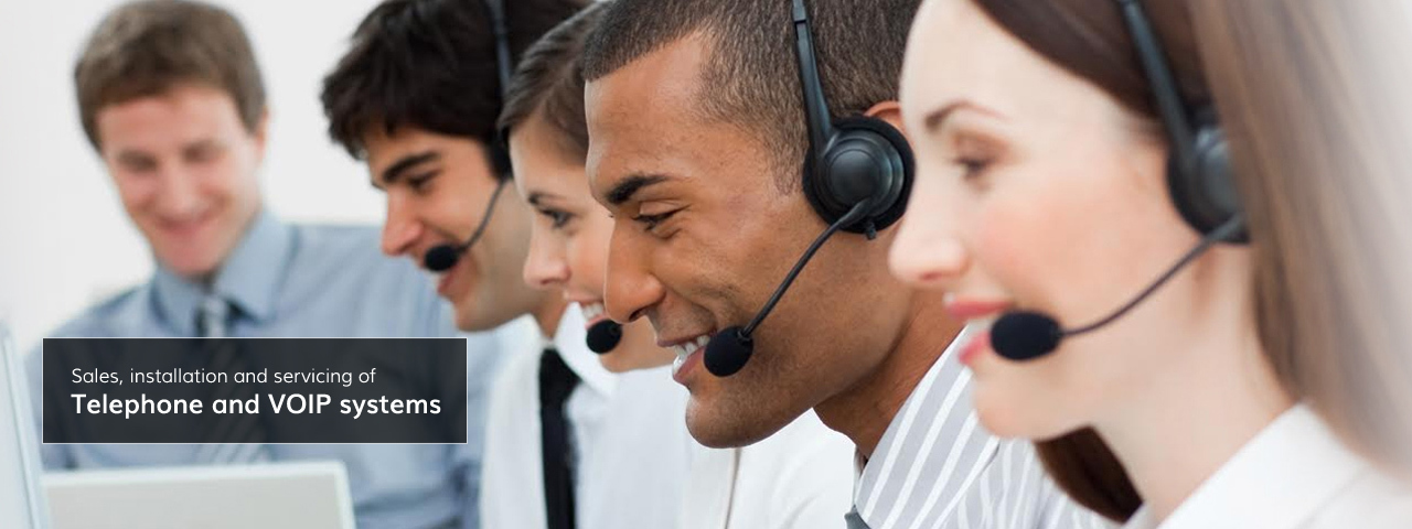 Team with headsets on | Telephone system installation Christchurch